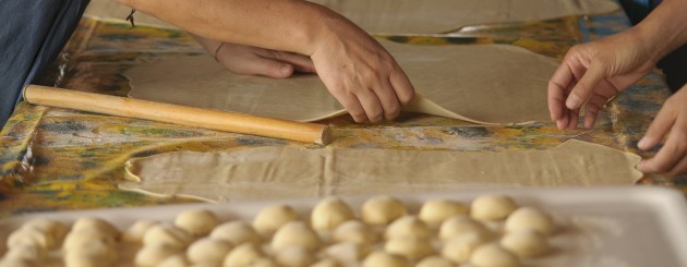 Female Hands Kneading Pasta