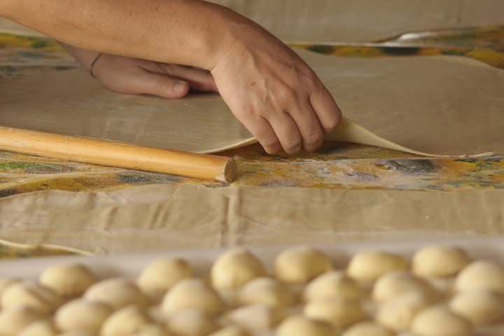 Female Hands Kneading Pasta