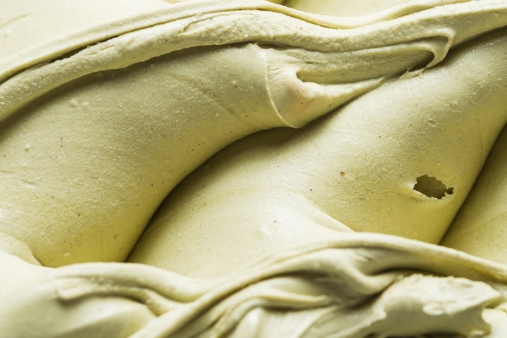 Close up of a surface texture of a creamy green Ice cream.