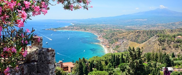 Taormina town with Mount Etna on background